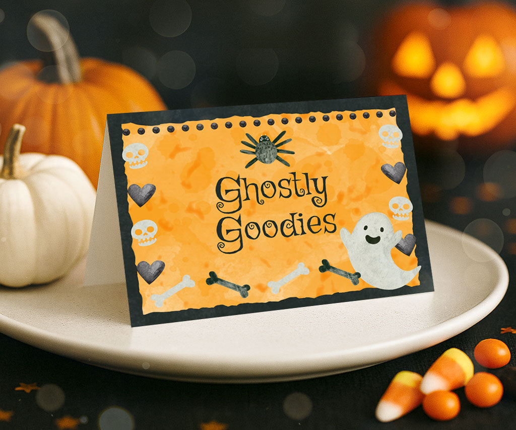 Halloween food tent card with ghost, bones, skulls, and hearts.