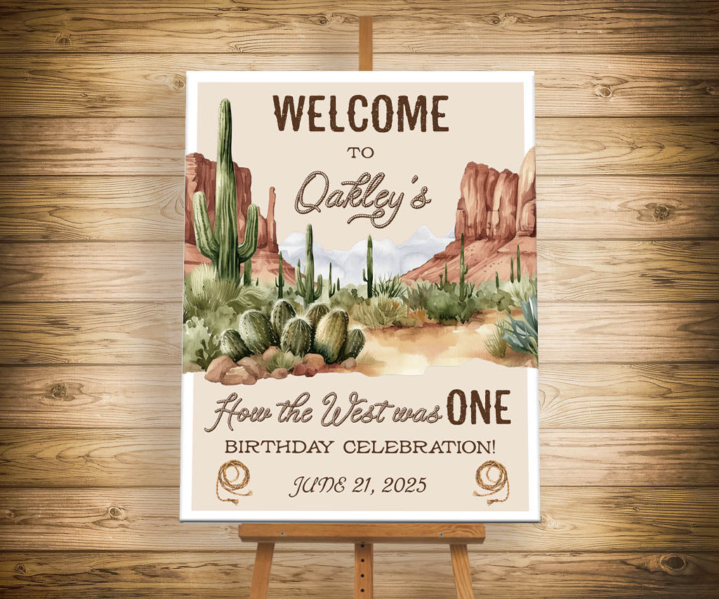 How the west was ONE cowboy birthday welcome sign with desert landscape.