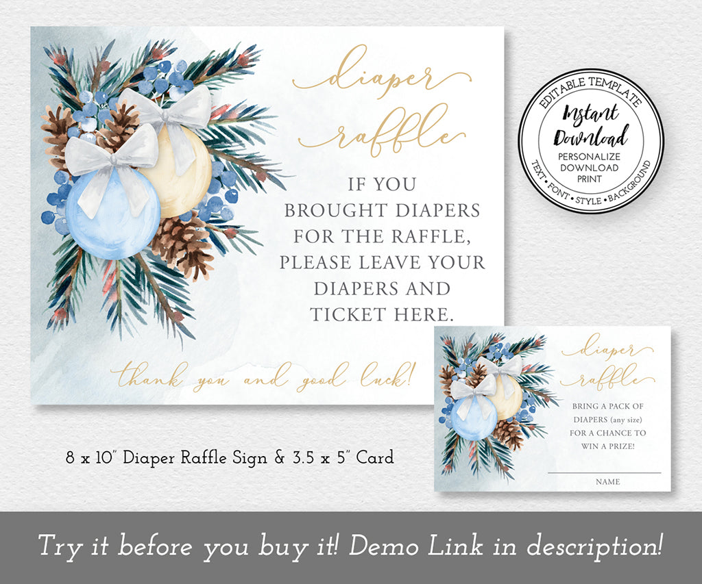 Winter baby shower diaper raffle sign and card with blue and gold holiday ornaments and pine greenery.
