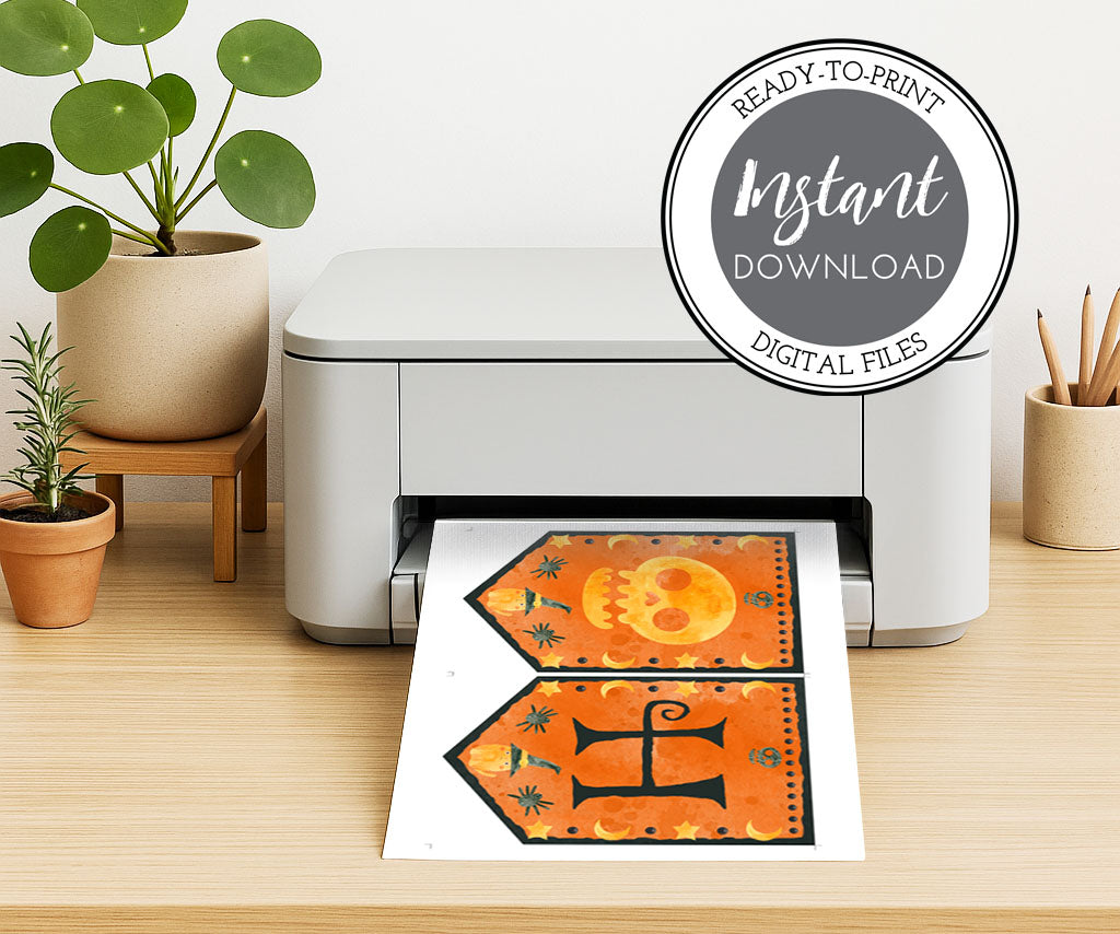 Happy Halloween banner printable page on a printer with skull, witchy cat, spiders, moon & stars.
