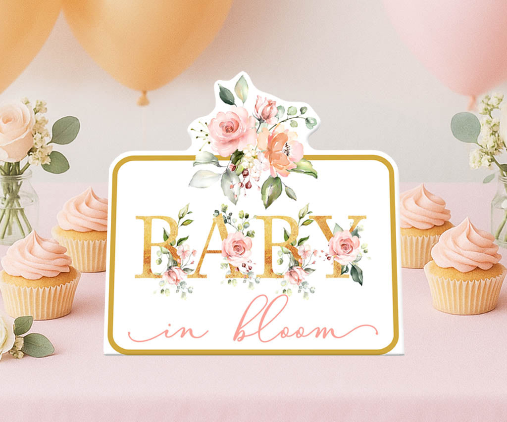 Floral Baby in Bloom printable centerpiece on dessert table with cupcakes and balloons – perfect for spring or summer baby showers.