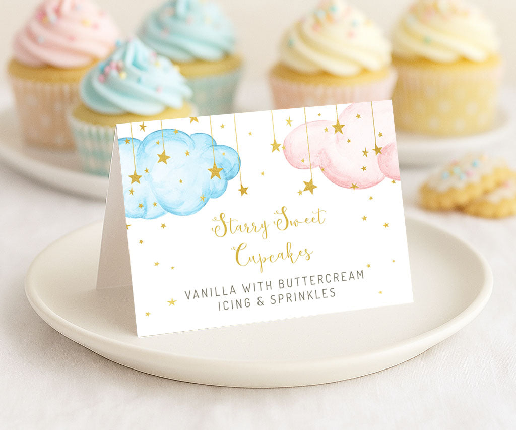 Dessert table food card in pink and blue with gold stars for a baby gender reveal party.
