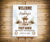 First Rodeo birthday welcome sign on easel featuring a sweet baby pony in a cowboy hat.