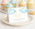Folded food card with blue clouds, gold stars.