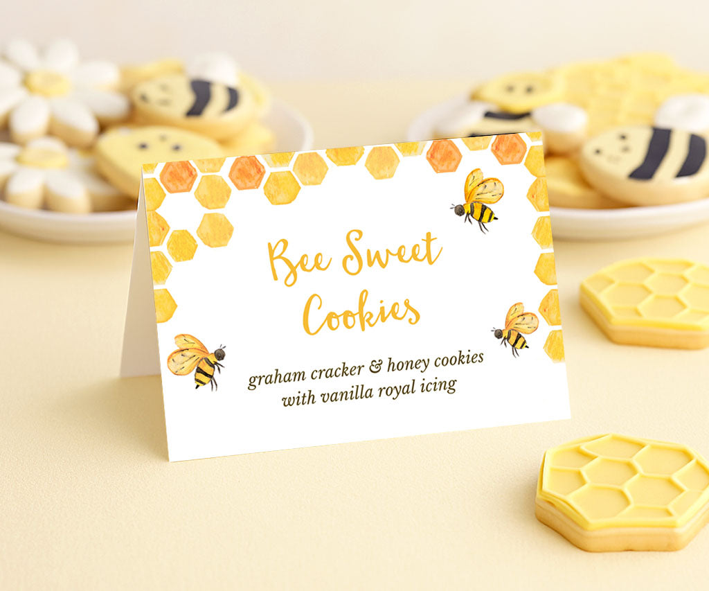 Bee baby shower food tent card with honeycomb and bees.