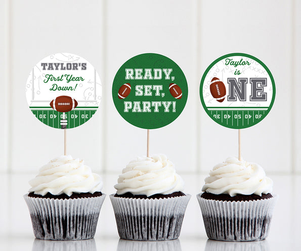 First birthday football cupcake toppers, first year down, ready set party and Taylor is One.