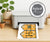 Happy Halloween banner on a home printer with cute ghosts, spiders and a skull & hearts border.