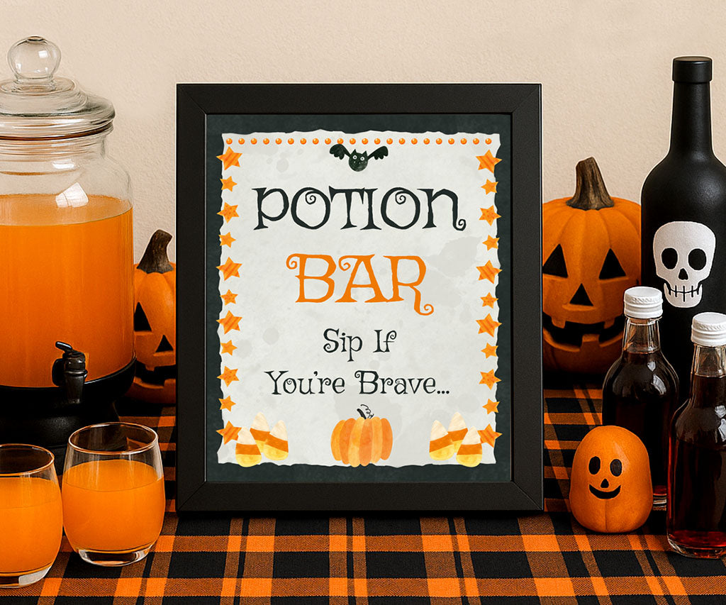 Halloween potion bar sign printable with pumpkin and candy corn.
