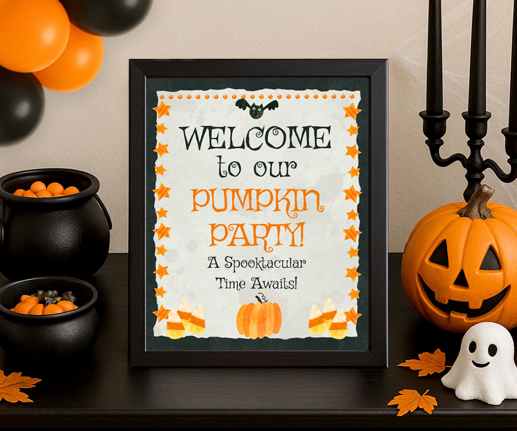 Halloween welcome to our pumpkin party sign printable with pumpkins and candy corn.