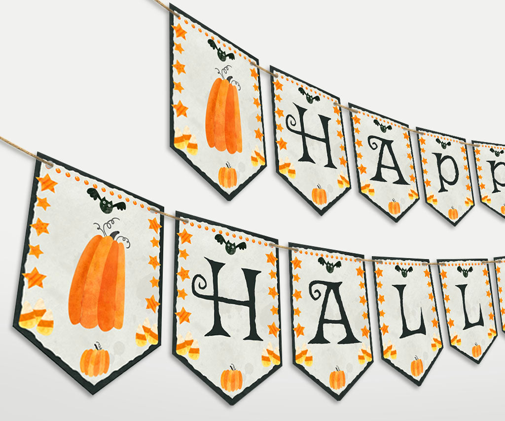 Happy Halloween printable banner with pumpkins, candy corn, stars & bats.