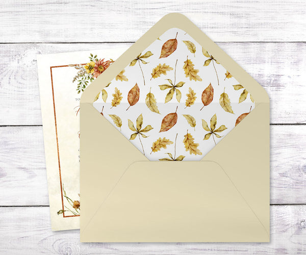 Cream color Invitation envelope with liner in rustic fall leaves in rust and gold.