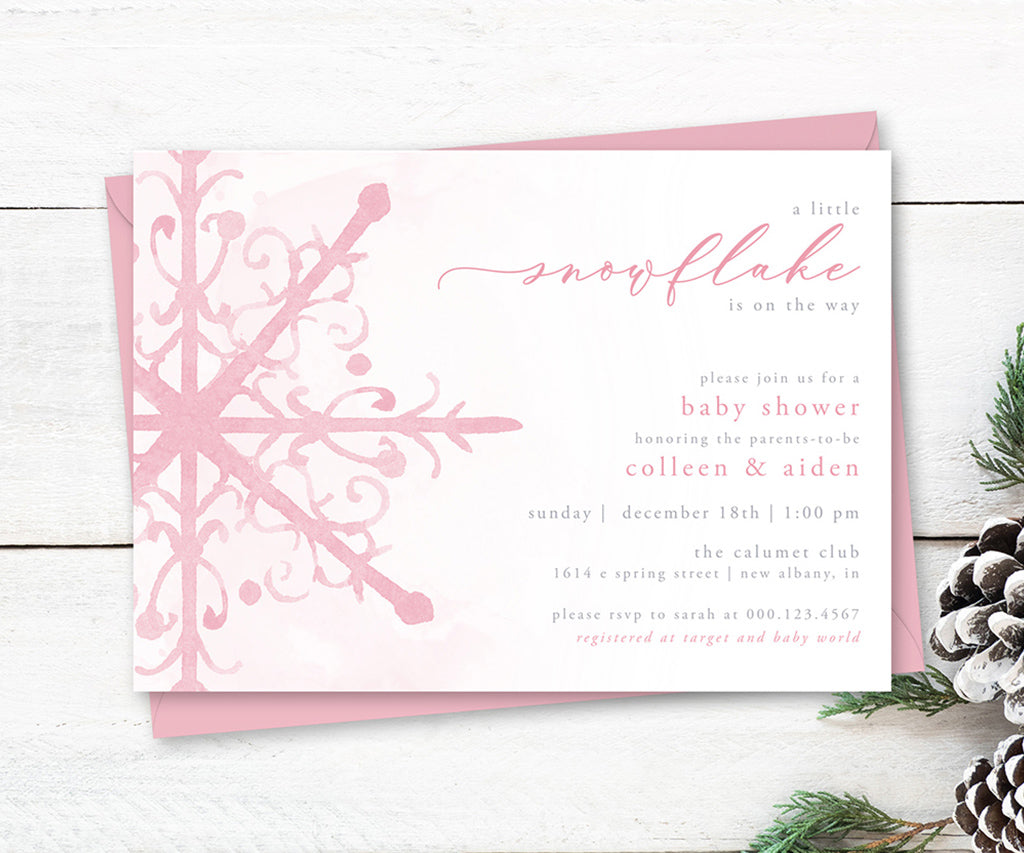 Pink snowflake winter baby shower invitation.