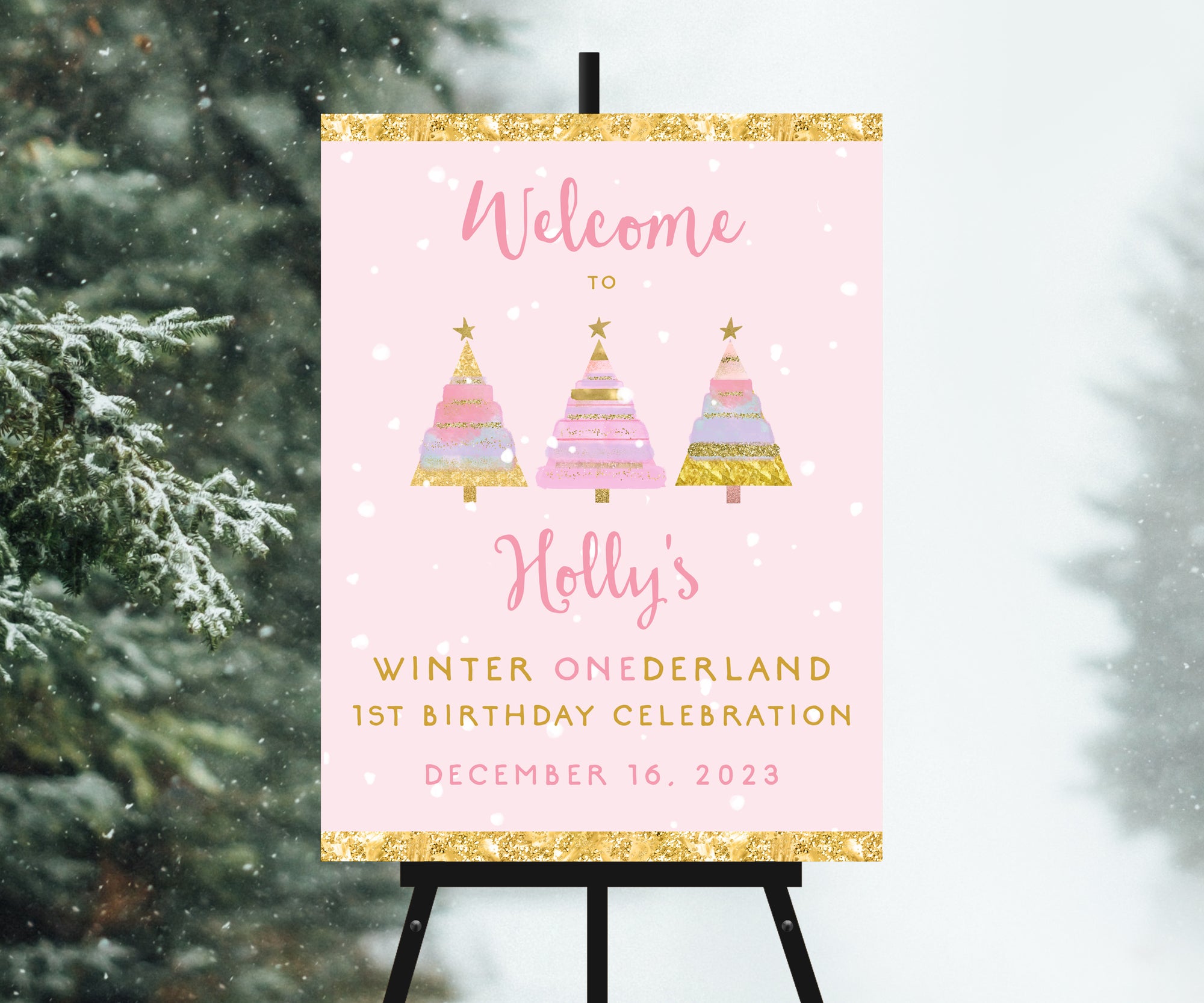 Pink and gold winter onederland first birthday welcome sign on easel.