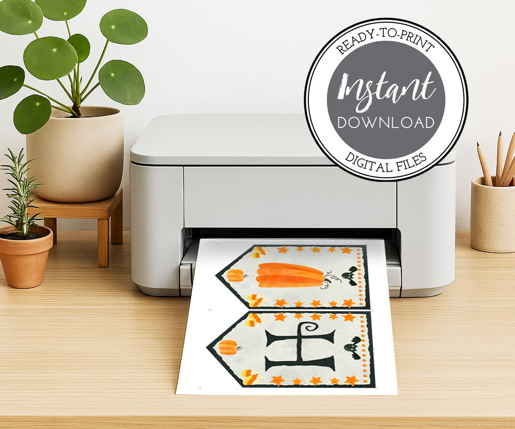 Pumpkin & candy corn printable Halloween banner on a home printer.