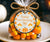Round Halloween favor tag with candy corn and pumpkin design.