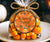 Round Halloween favor tag with a cute witchy cat and celestial accents.