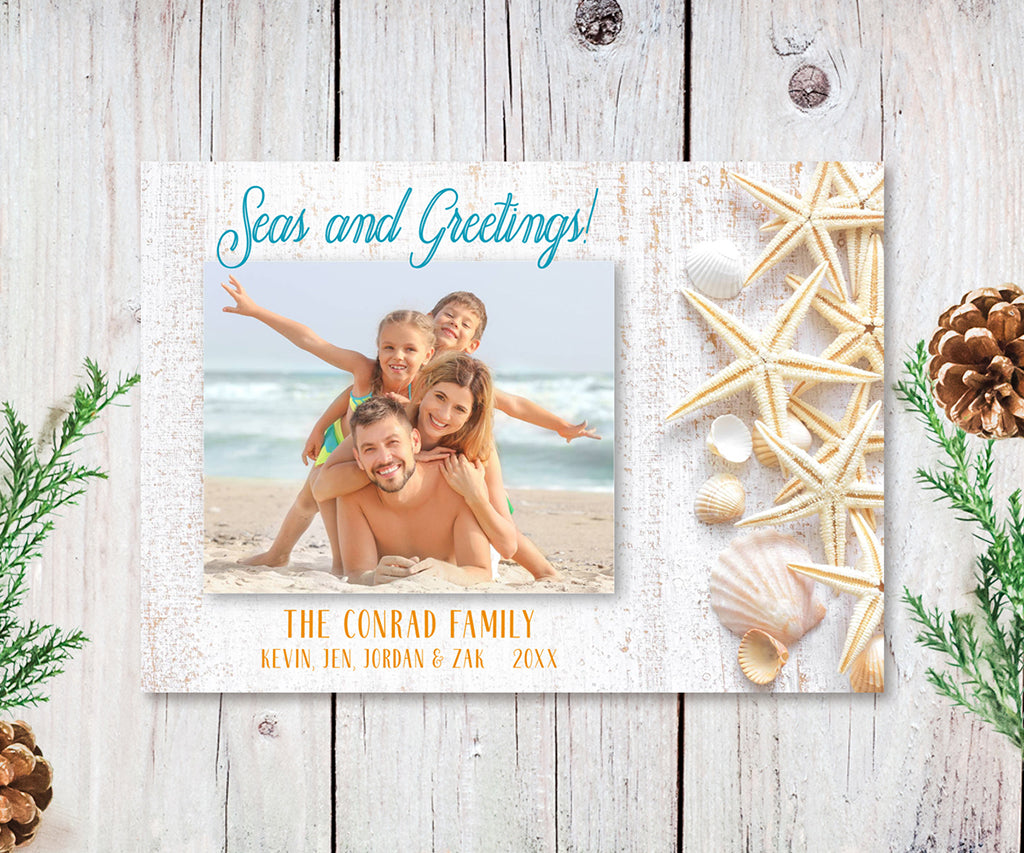 Seas and greetings beach theme Christmas Card with family photo.