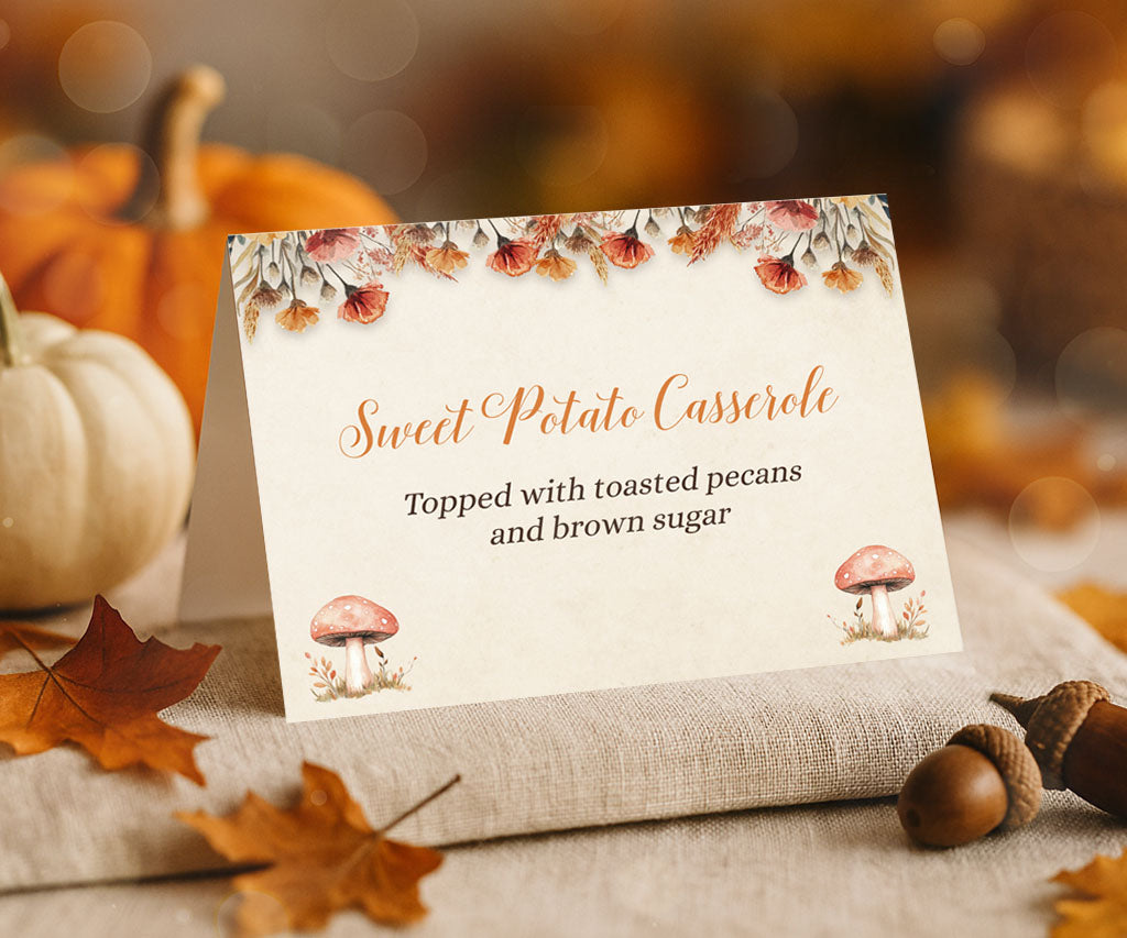 Food tent card for thanksgiving or fall gatherings with soft florals and cute mushrooms in a cottagecore style.