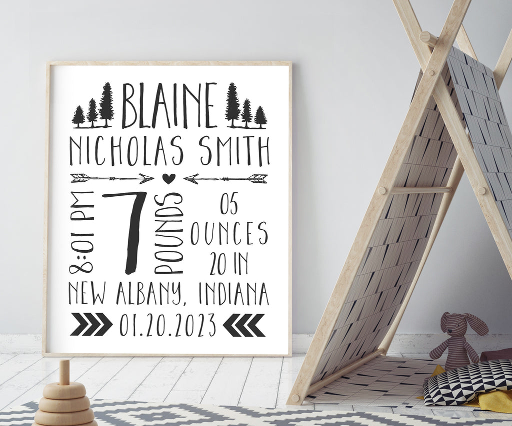 woodland tribal theme birth stats nursery wall art with trees, arrows and chevron motifs personalized with baby birth details in black and white