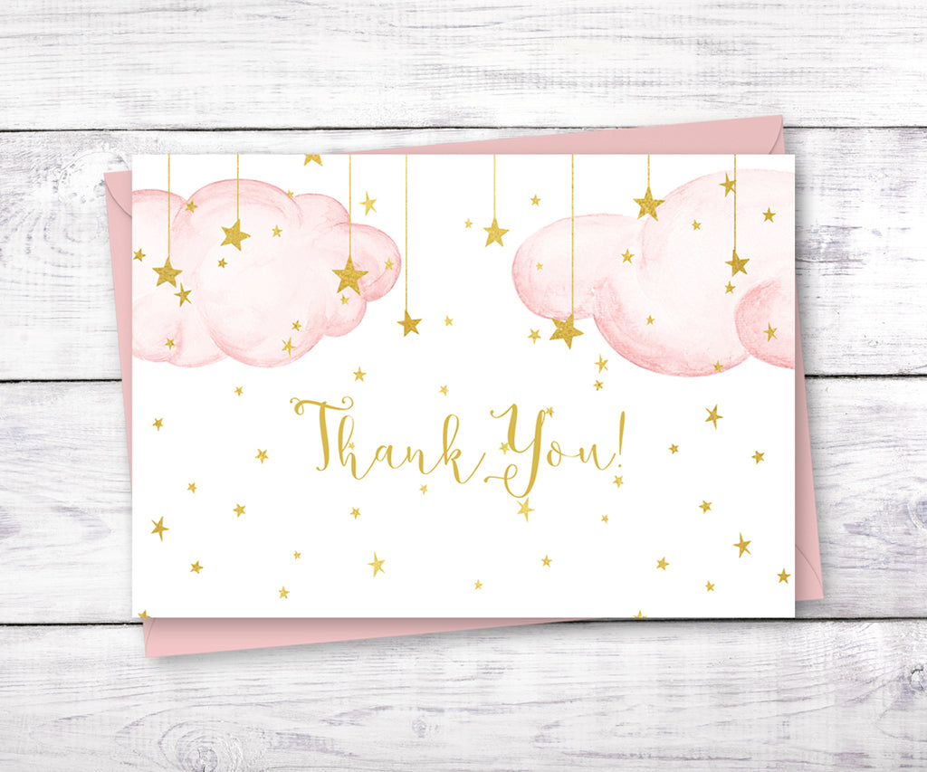Twinkle little star baby shower thank you card with pink clouds and gold stars.
