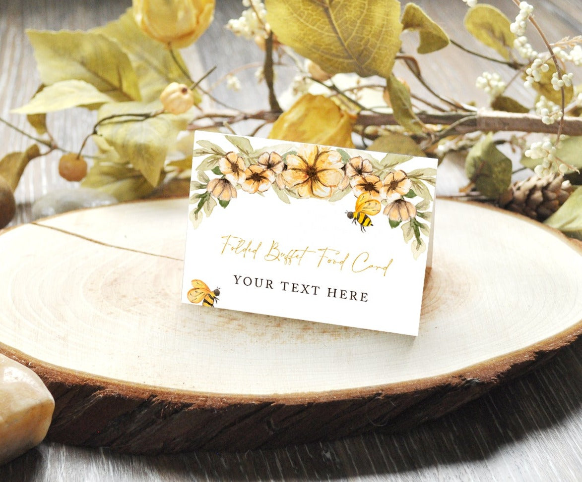 Folded buffet food card for baby shower or gender reveal party with yellow flowers and bees.