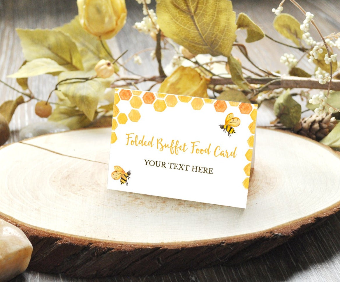 Folded buffet food card with honeycomb and bees for a baby shower or gender reveal.