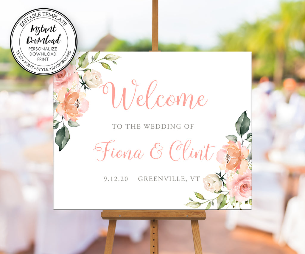 pink and white floral wedding welcome sign on easel